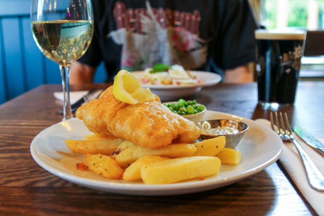 Golden and crispy fish and chips from the pub's super saver menu for lunch